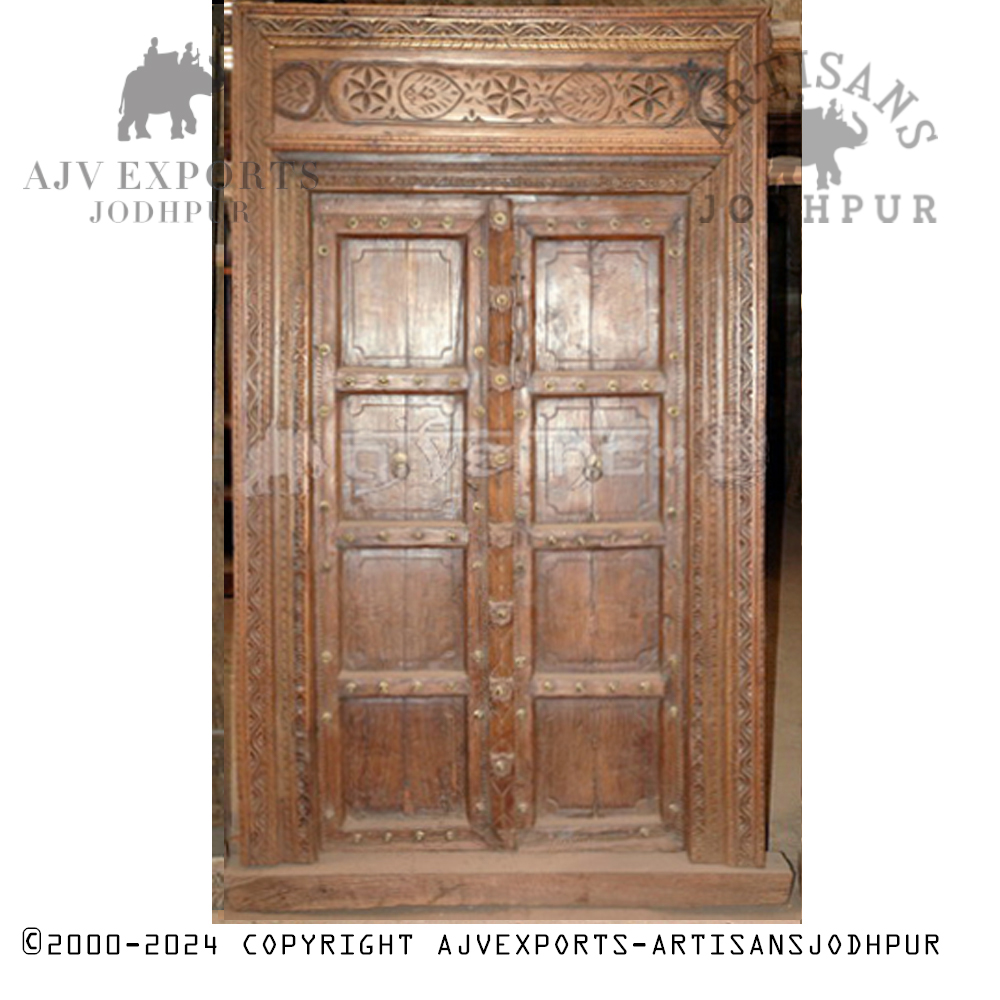 Rustic wooden door with arched top