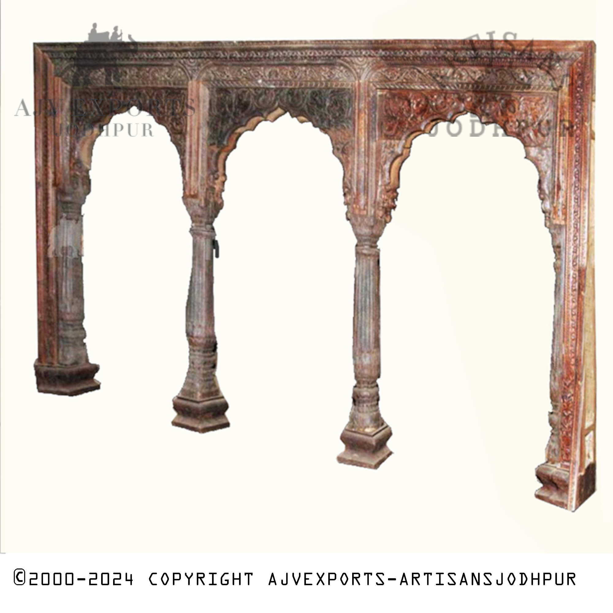 An elegant archway in traditional Indian style from Jodhpur, beautifully carved, serving as a striking architectural feature.