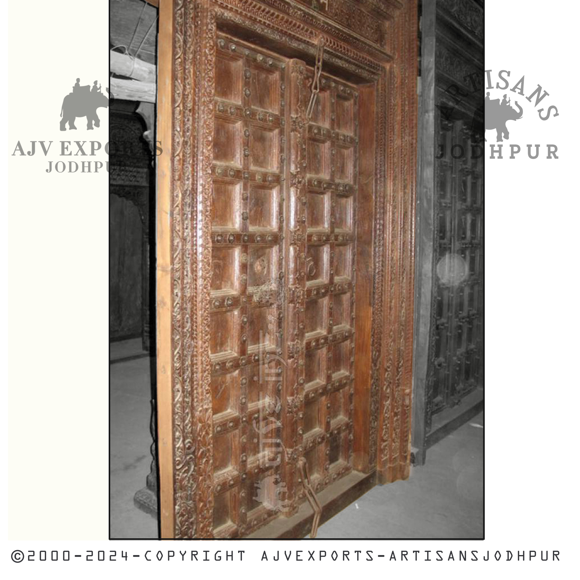 An elegant carved wooden door with intricate brass detailing, showcasing a blend of traditional craftsmanship and modern elegance from AJV Exports Jodhpur