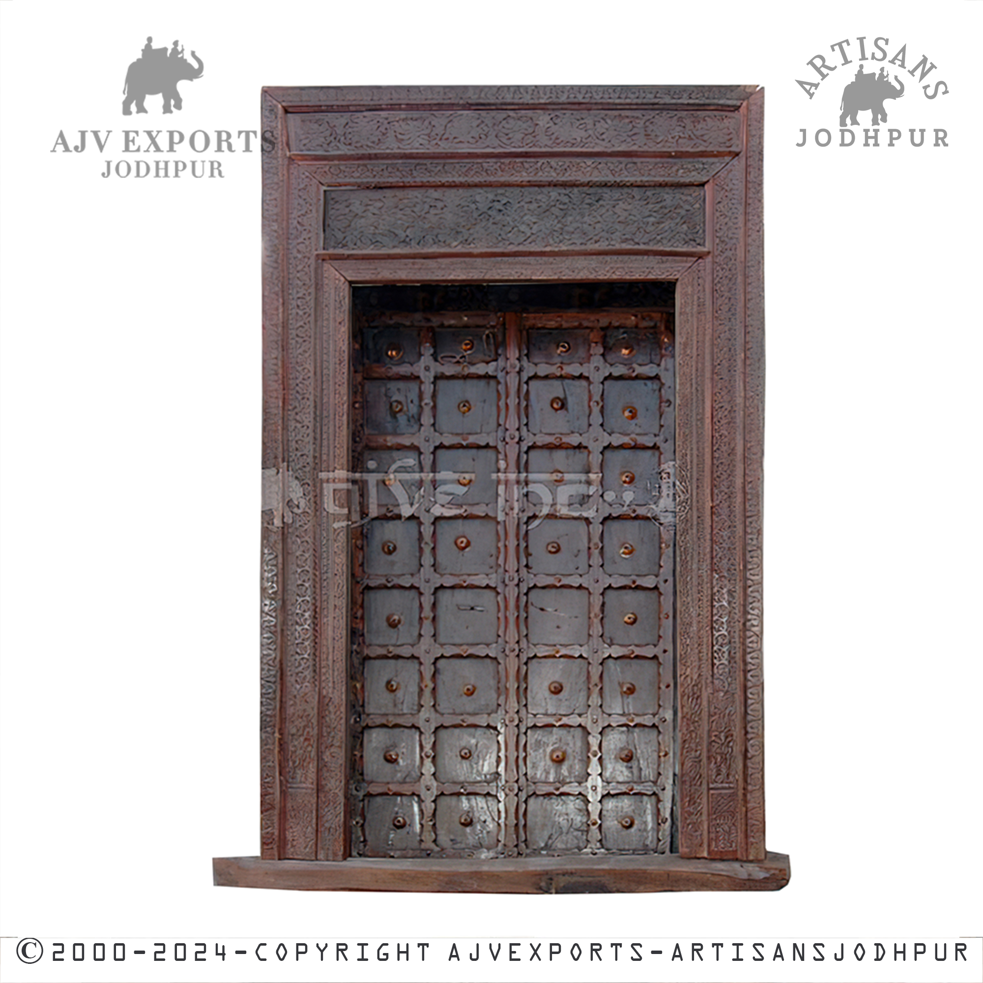 An intricately carved traditional door with detailed patterns and an aged finish, showcasing the artisanship of Jodhpur.