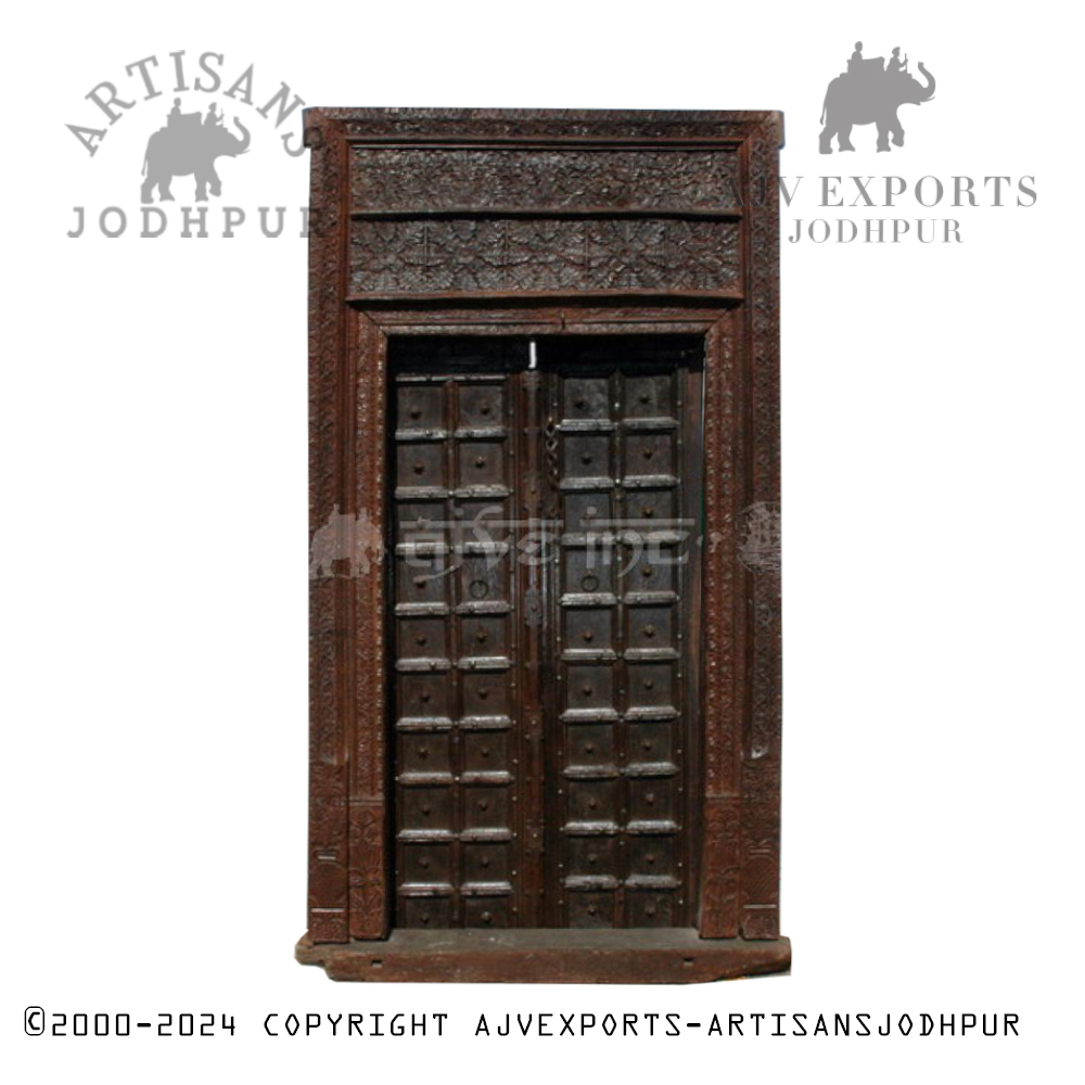 Antique wooden door with grille design and a weathered finish from Artisans Jodhpur.