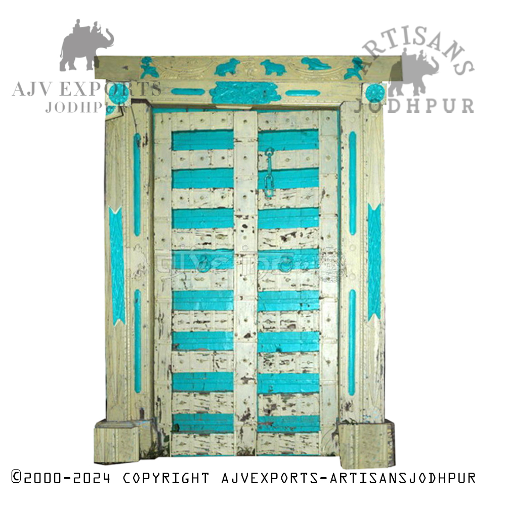 Vintage brown wooden door with metal ornaments, handcrafted by Artisans Jodhpur.