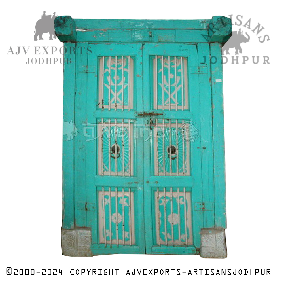 Antique wooden door with elaborate carvings and a rich finish, crafted by Artisans Jodhpur.
