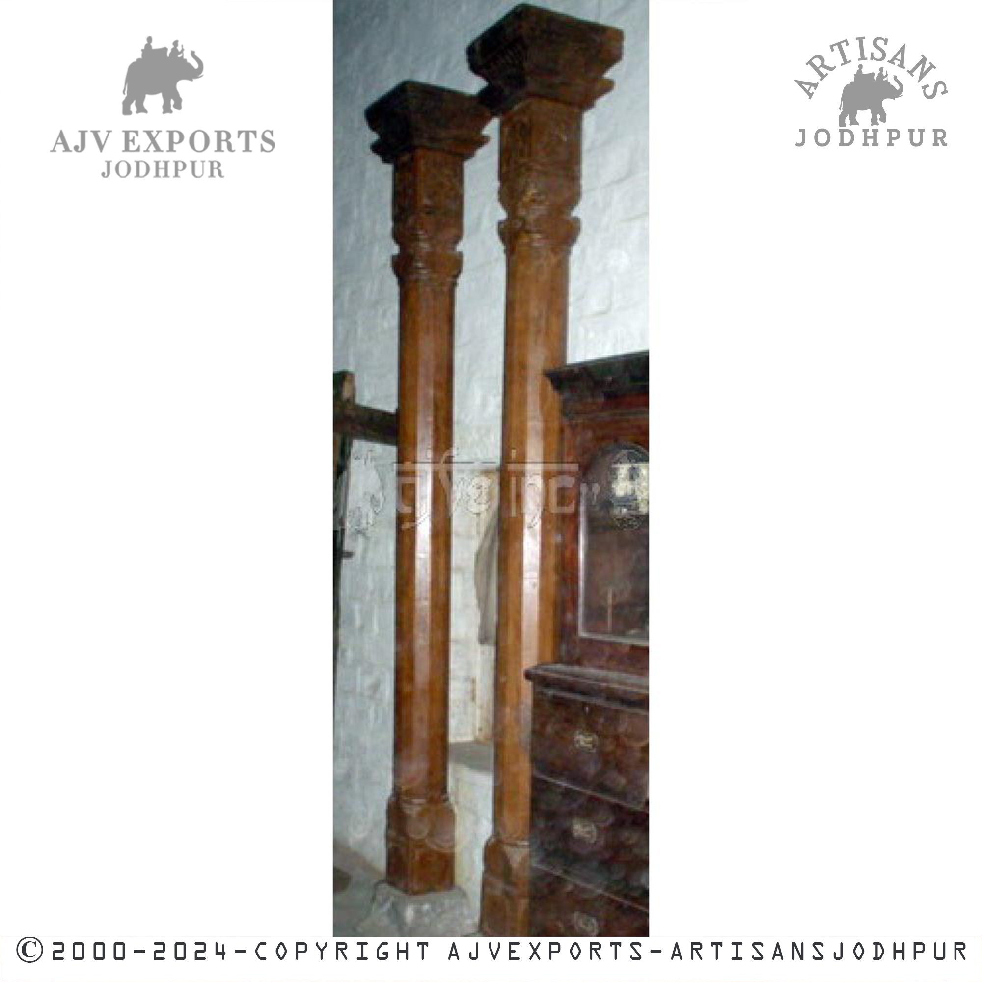 Twin wooden columns with a smooth, light brown finish and a modern, minimalistic design.