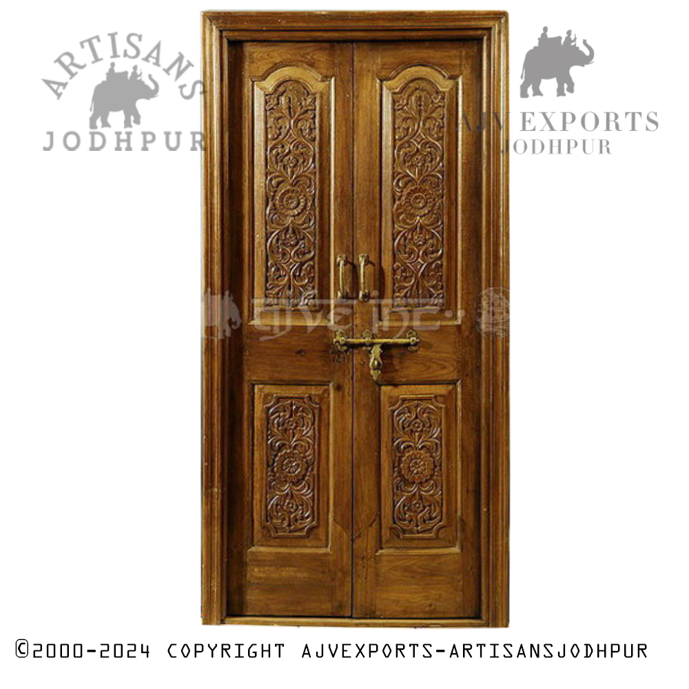 Traditional brown wooden door with decorative carvings and a classic design from Artisans Jodhpur.