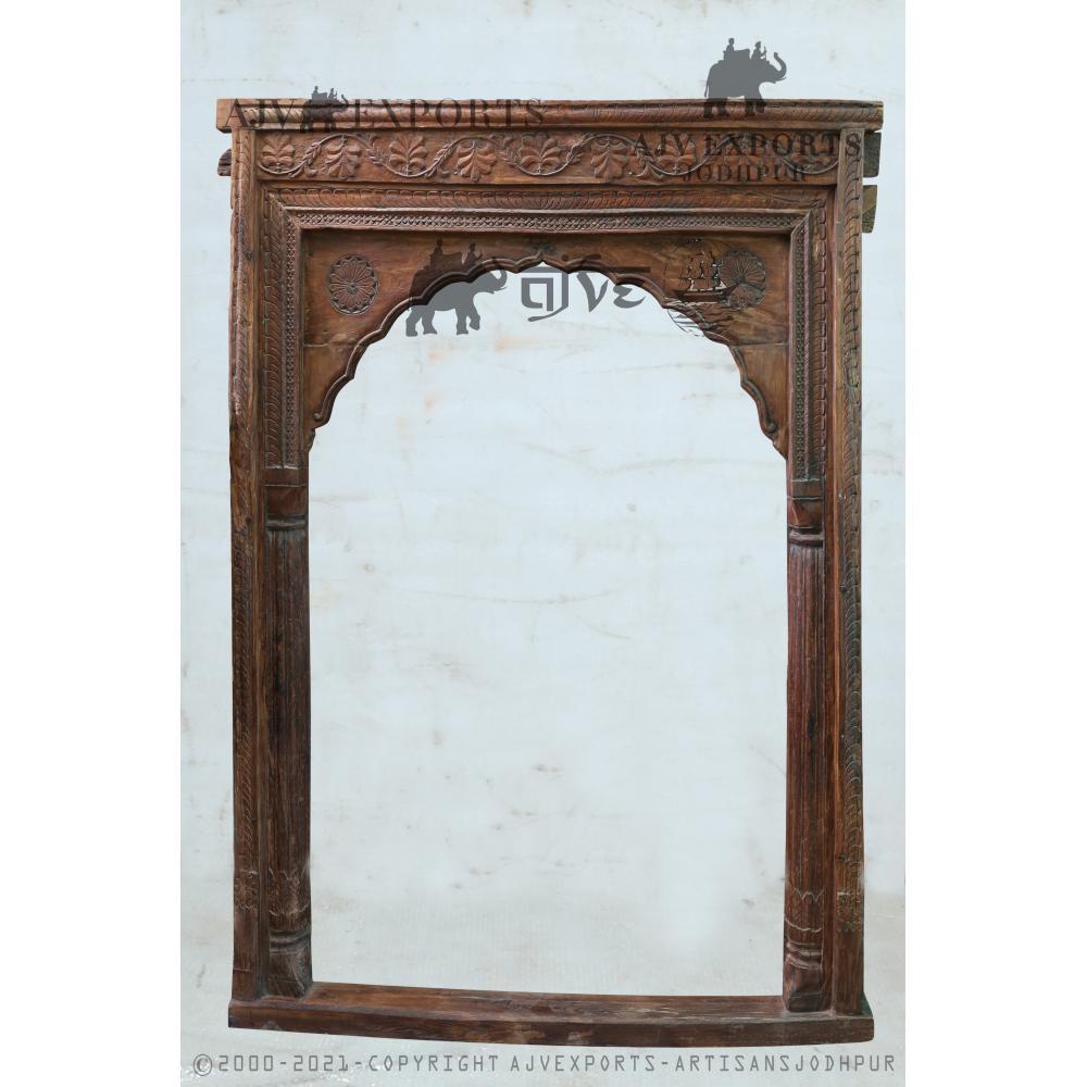 Exquisitely carved wooden archway frame with floral and geometric motifs