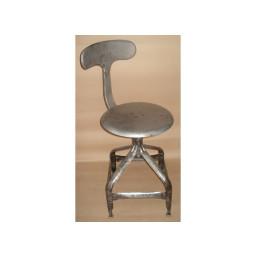 industrial iron adjustable bar chair with whale tail backrest.