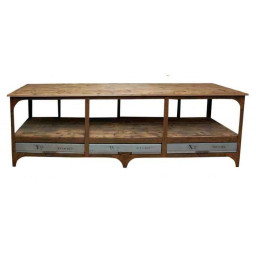 industrial rustic entertainment console with three drawers and a bottom shelf.