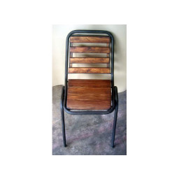 industrial iron pipe and wood chair