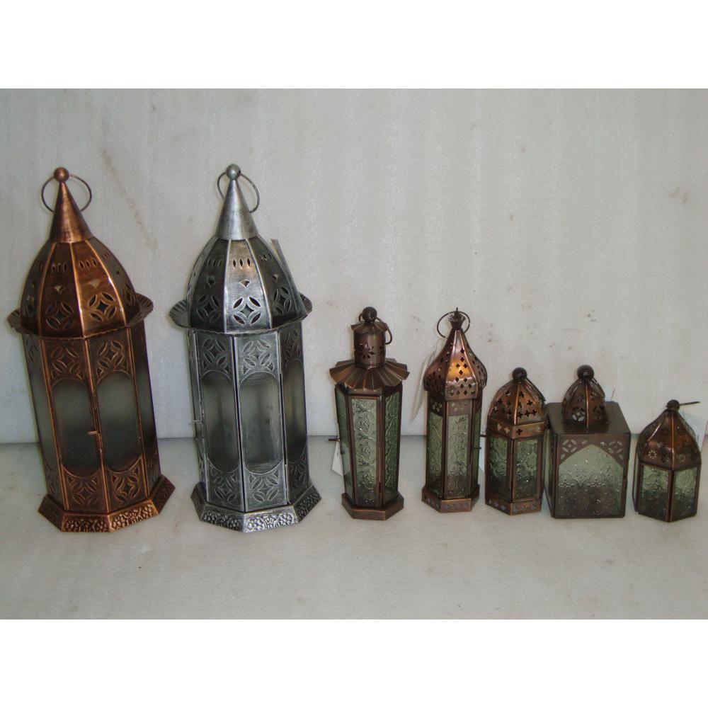 Collection of metallic lanterns in different sizes and designs with artisanal craftsmanship.