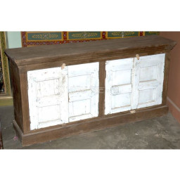 Wooden storage cabinet with four white painted doors in rustic finish