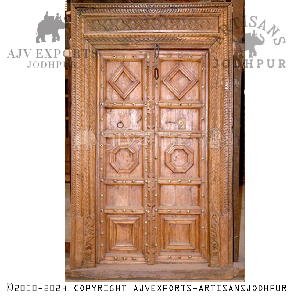 Wooden door with diamond-shaped carvings