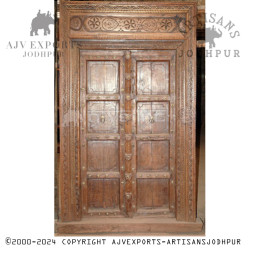 Simple wooden door with arch design