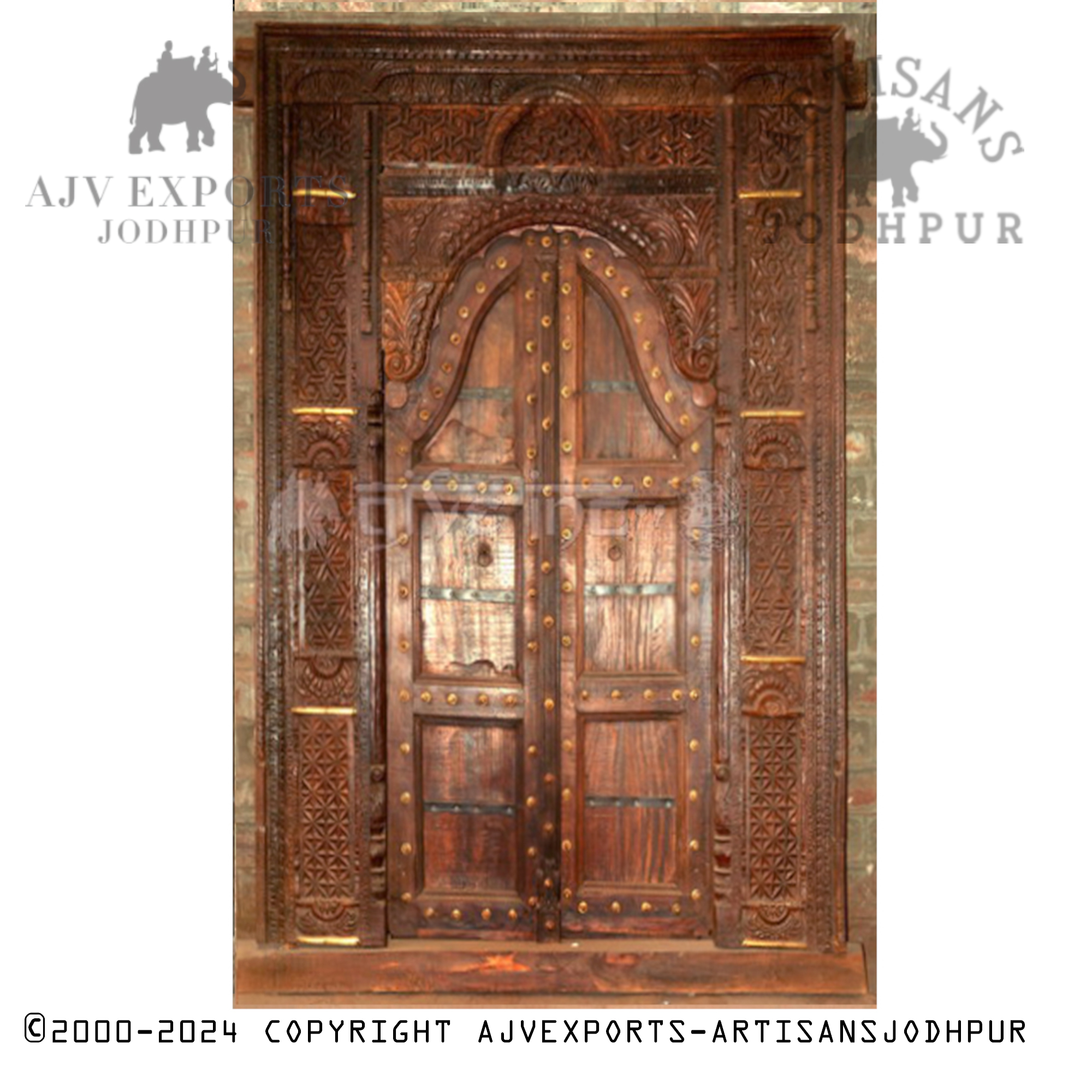 Ornate wooden door with arched design