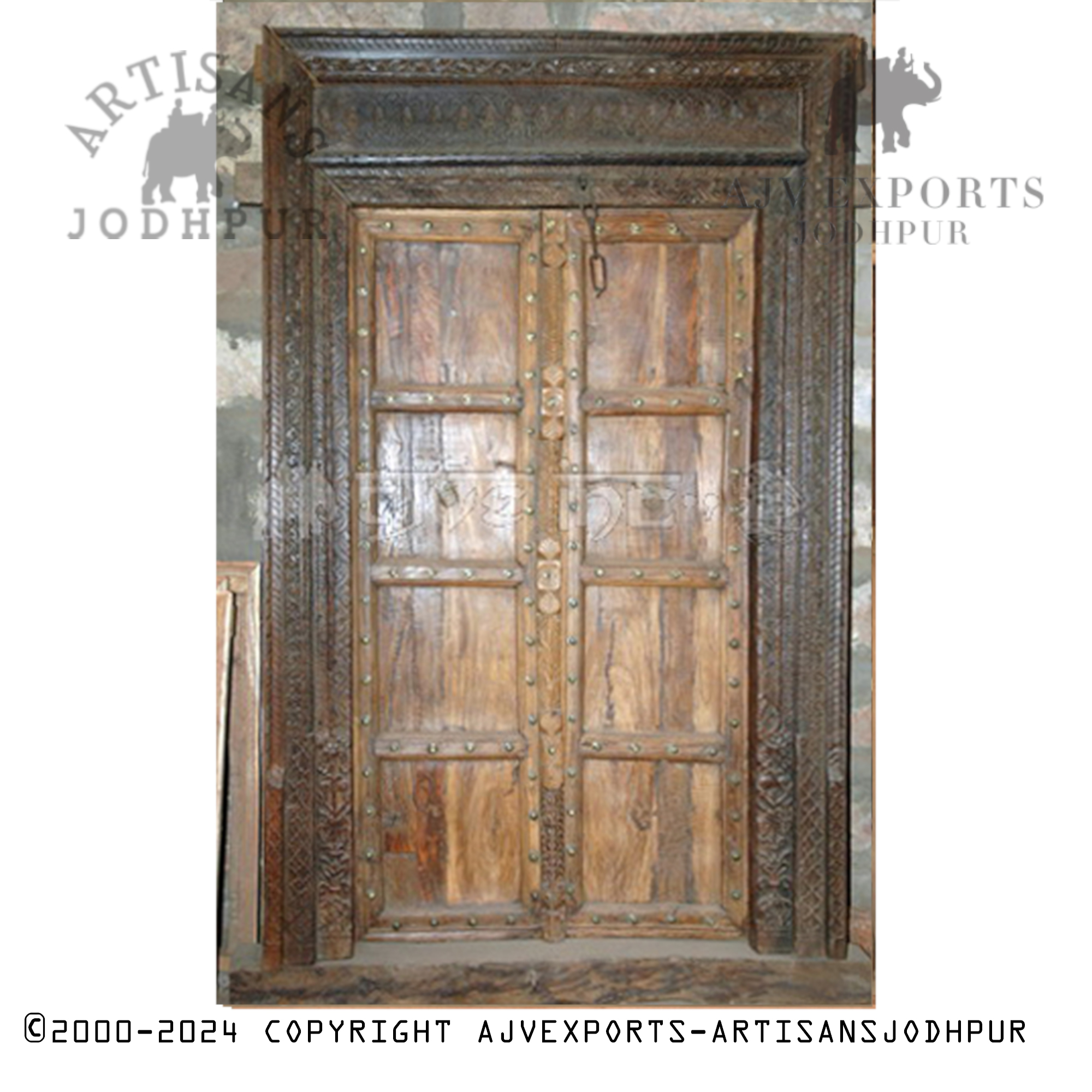 Wooden door with natural finish and detailed carvings