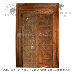 Wooden door with natural finish and detailed designs