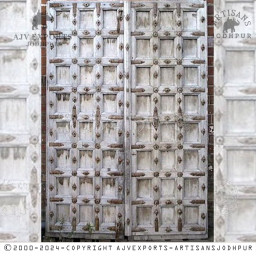 Ornate wooden door with detailed carvings