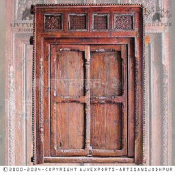 Antique wooden door with intricate carvings