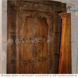 Traditional Wooden Door with Metal Details