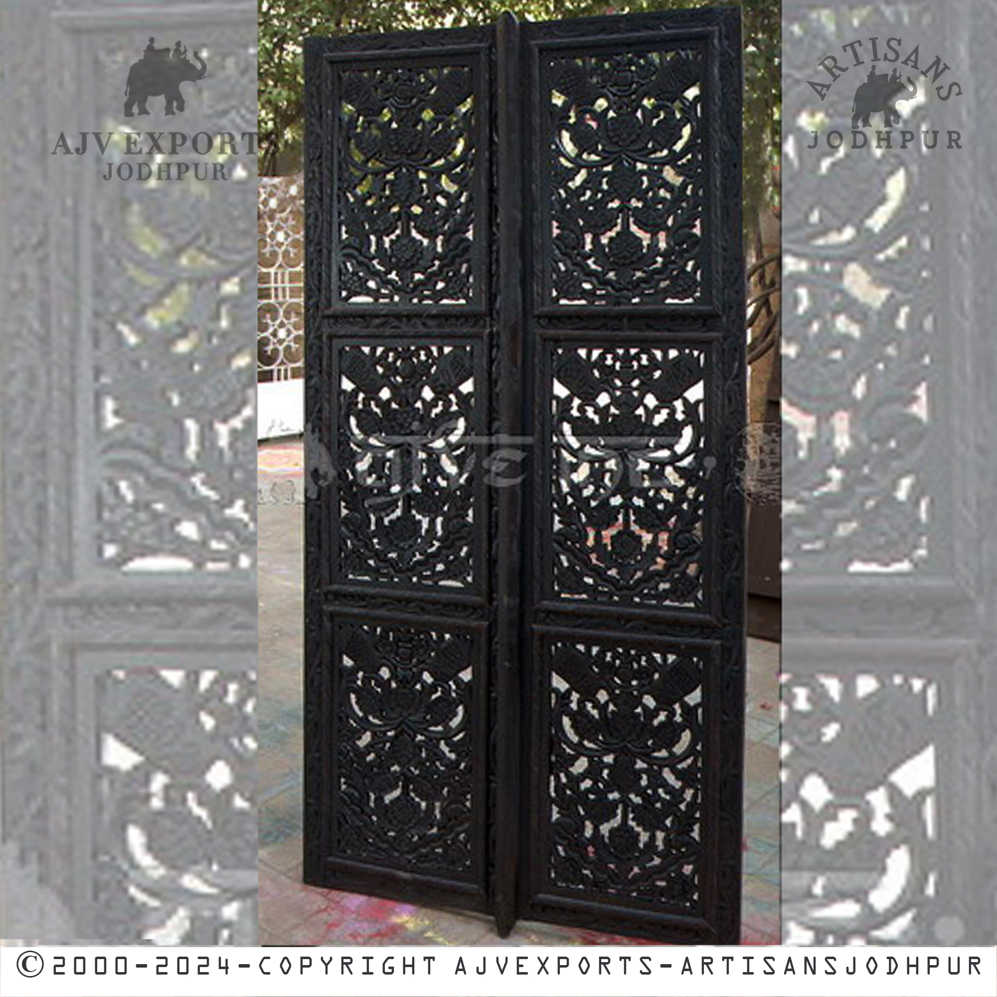 Traditional wooden door with decorative metalwork, adding character to rustic or historical settings.