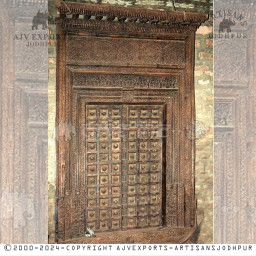 Vintage Wooden Door with Ornate Detailing