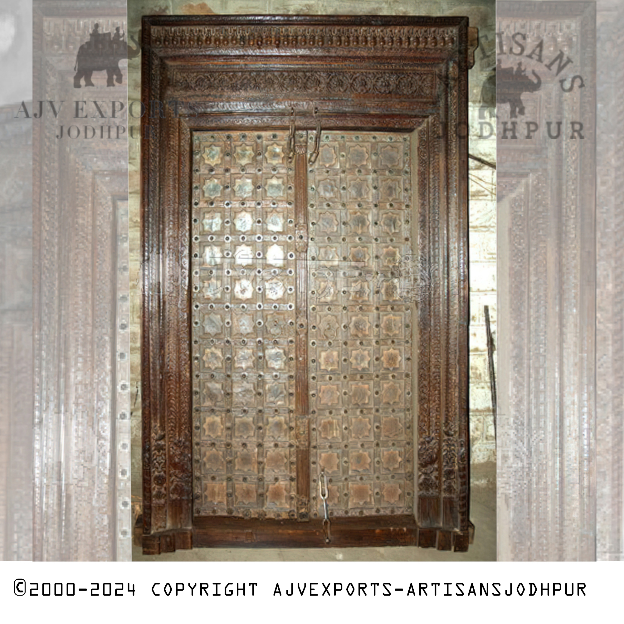 A handcrafted wooden door with detailed and intricate carvings, highlighting the artistic craftsmanship of Jodhpur, India.
