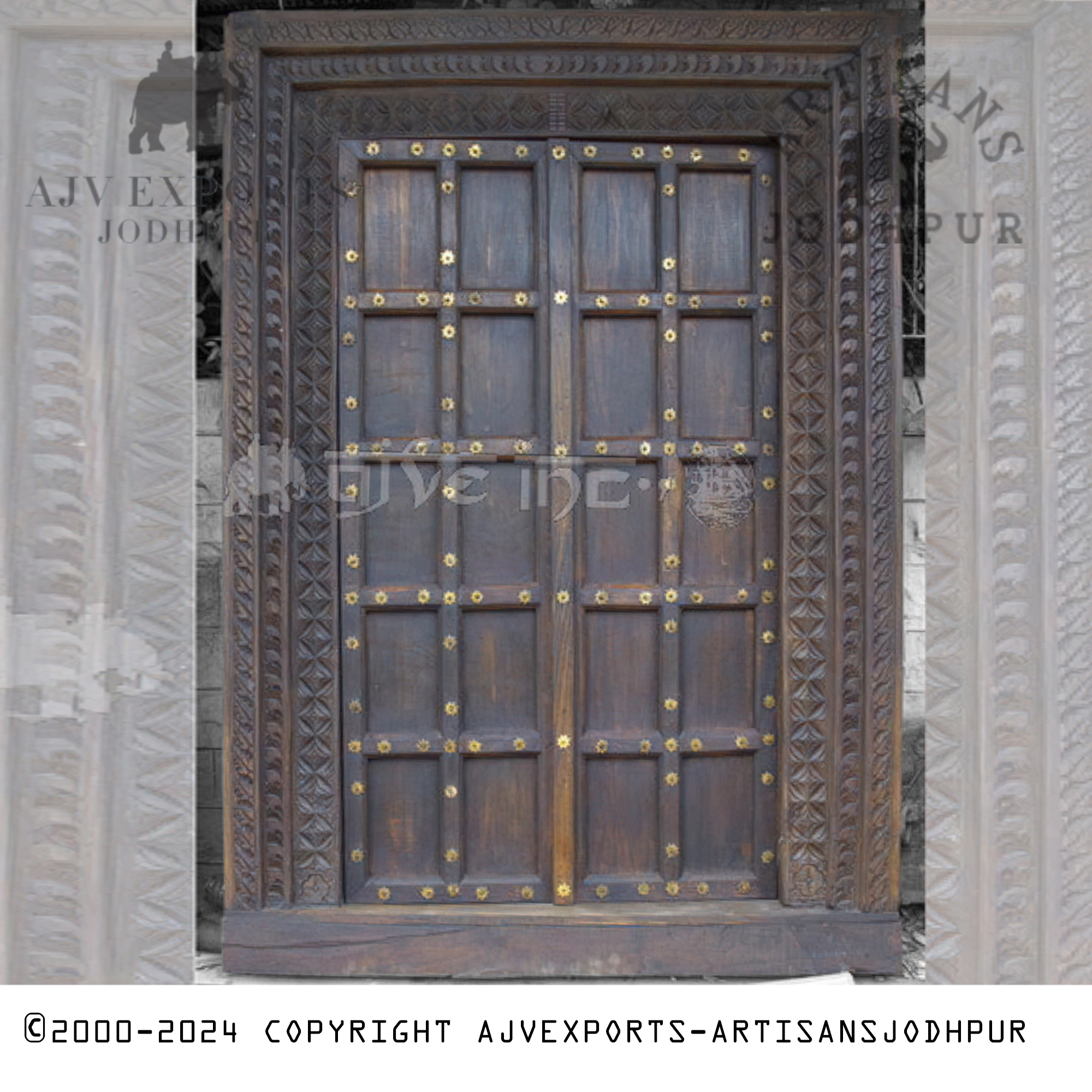 A classic wooden door from Jodhpur showcasing a geometric pattern, blending simplicity with the elegance of traditional craftsmanship.