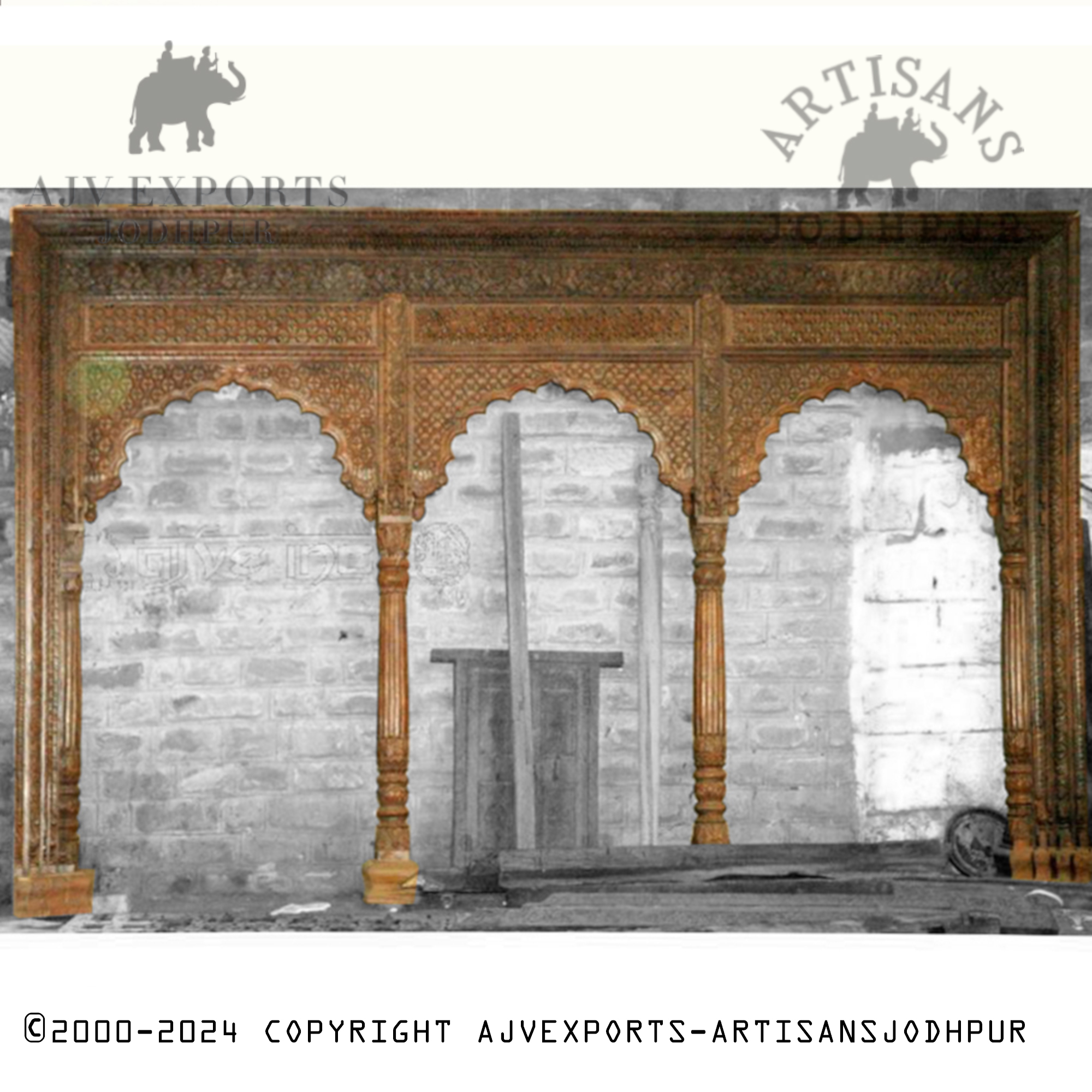 A classic Indian archway from Jodhpur, adorned with detailed artwork and traditional patterns, showcasing intricate craftsmanship.