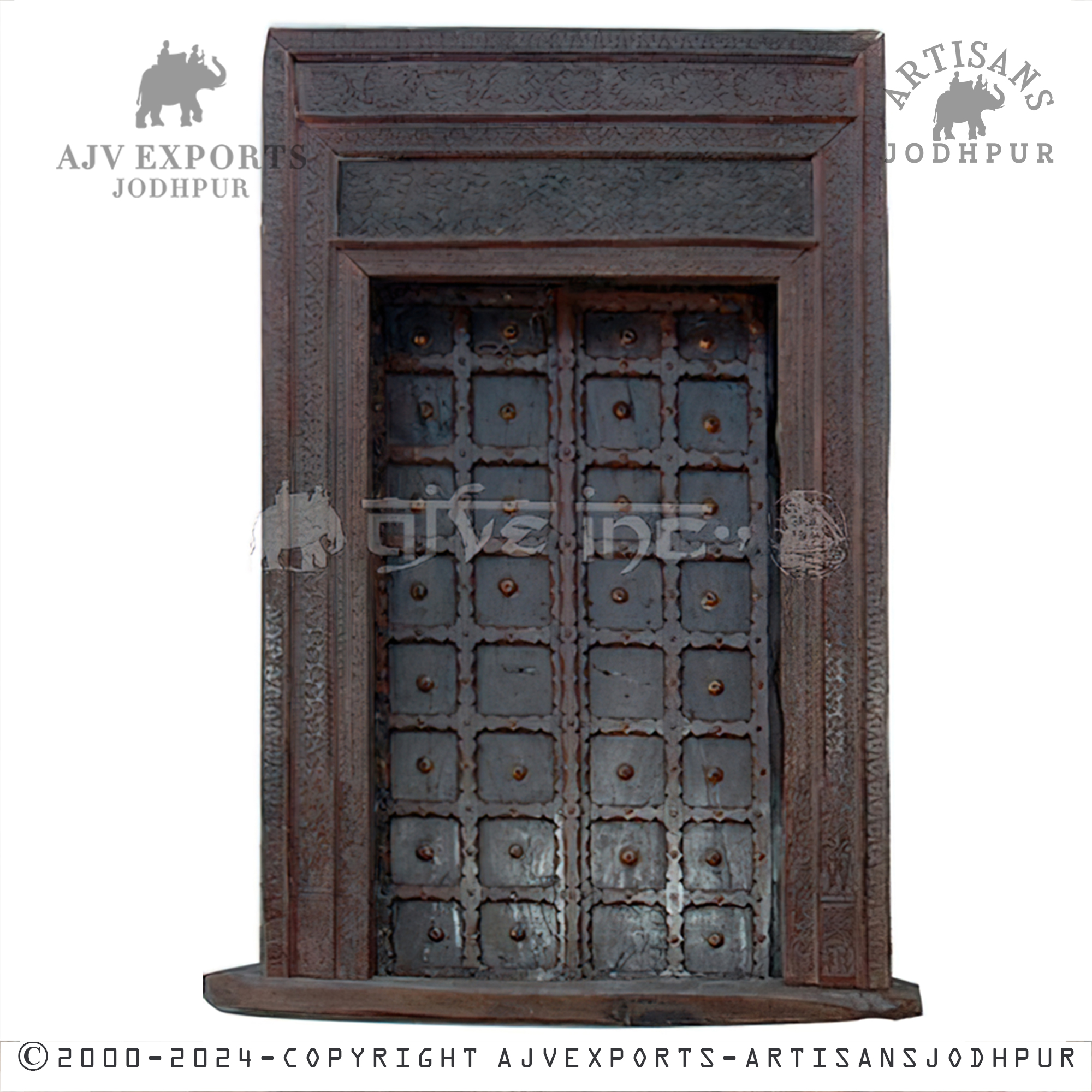 An antique Indian door from Jodhpur, featuring a rustic finish and adorned with metal studs, highlighting robust design and cultural artistry.