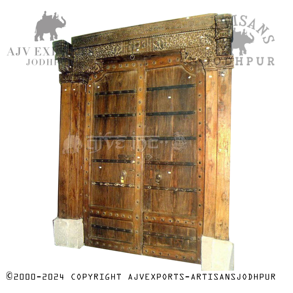 Classic Rajasthani door adorned with cultural motifs and traditional designs.