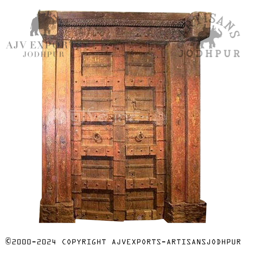 Traditional Rajasthani door with intricate design and classic wood craftsmanship.
