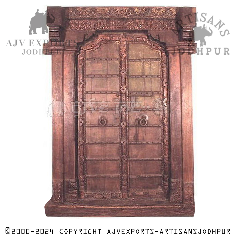 Classic Indian door with detailed woodwork and a timeless aesthetic.
