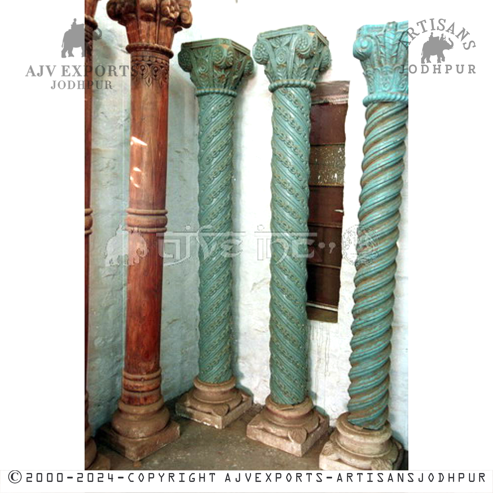 A collection of antique columns with different designs and finishes, showcasing a variety of architectural styles.