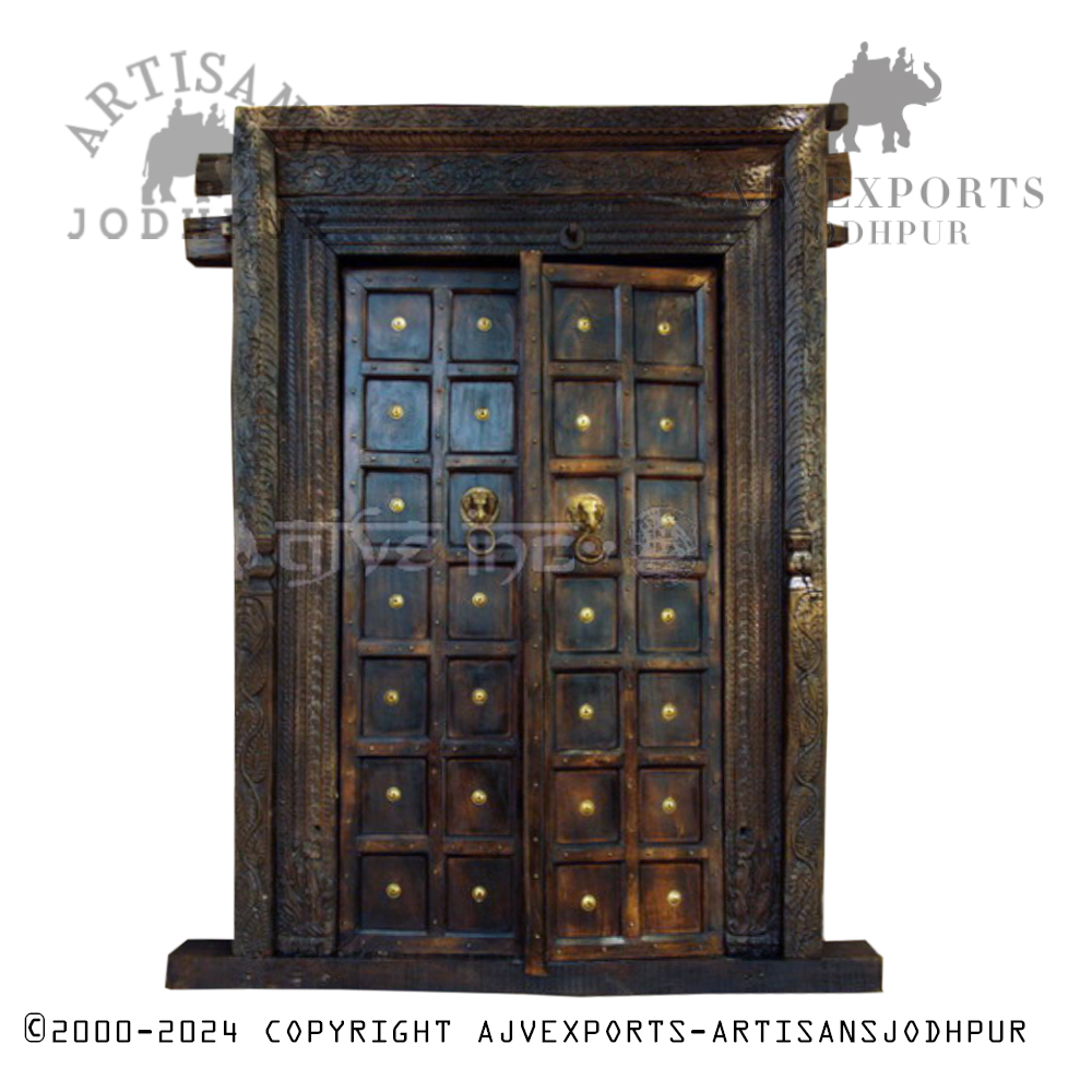 Vintage wooden door with metal rings and a robust design from Artisans Jodhpur.