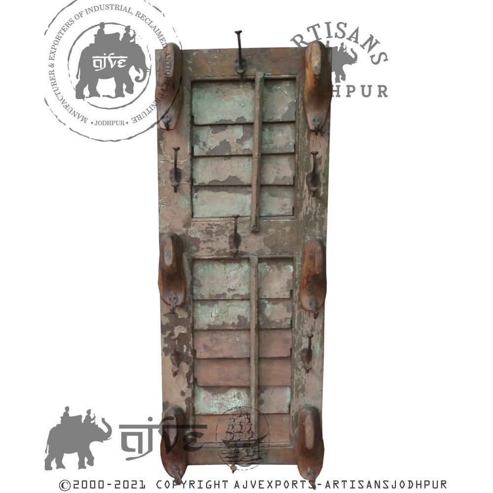 Intricately carved wooden door frame with traditional design