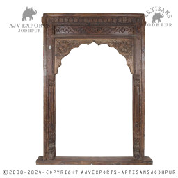 Carved wooden archway with traditional motifs