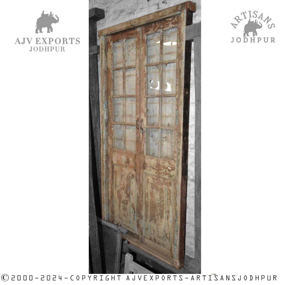 Handcrafted vintage wooden door with glass panel